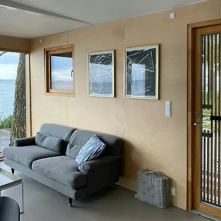 Modern Summer House By The Water In