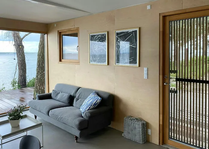 Modern Summer House By The Water In